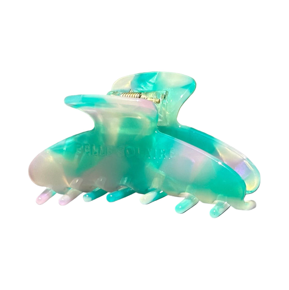 Hair claw clip made from plant-based cellulose acetate in aqua amethyst color.