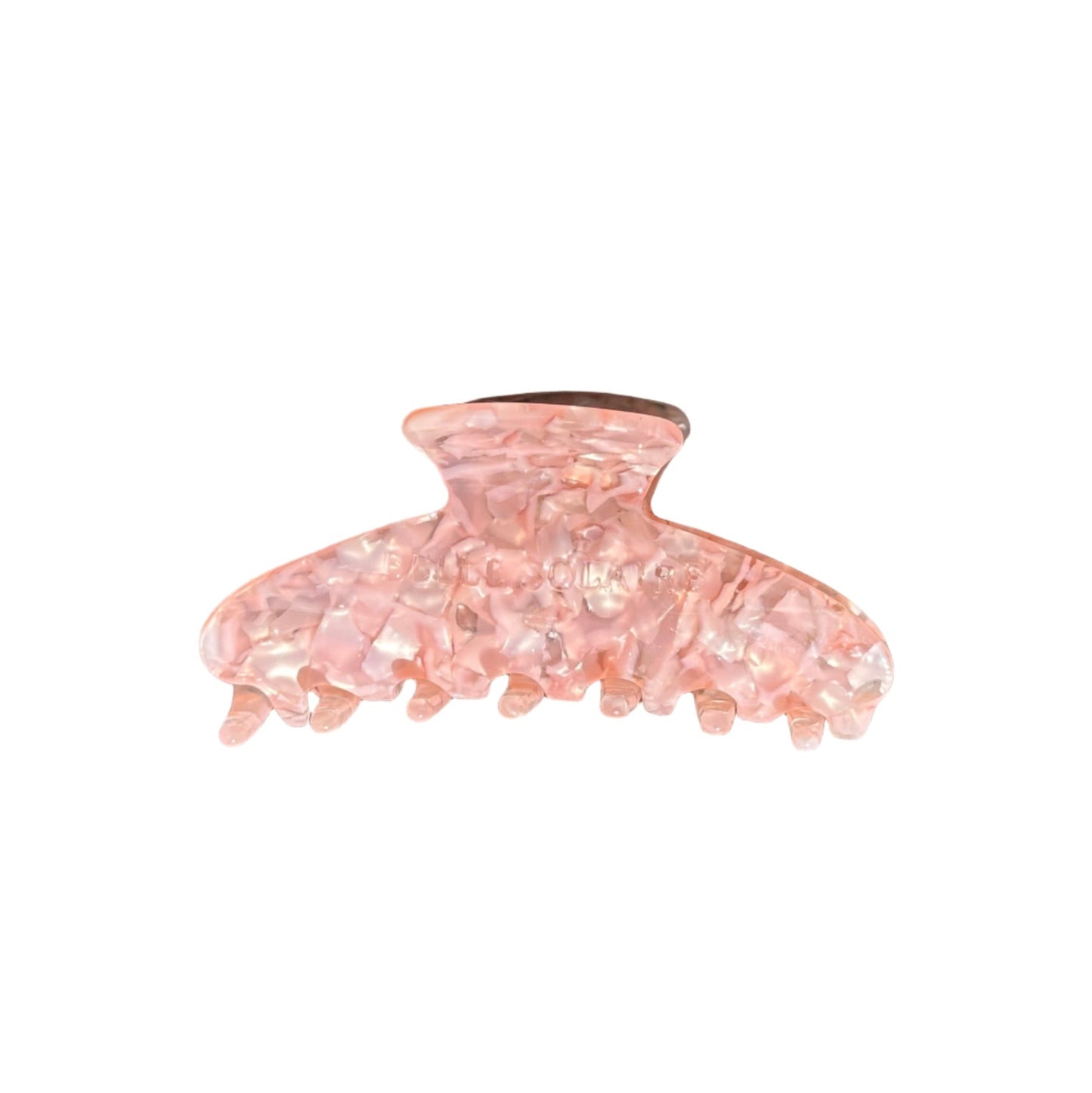 Romina hair claw clip with rose shavings in transparent cellulose acetate, front view on a white background.