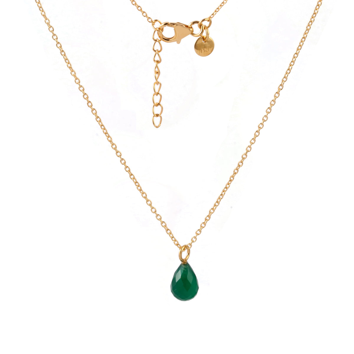 A delicate gold chain necklace featuring a small, polished teardrop-shaped green gemstone pendant, displayed against a clean white background.