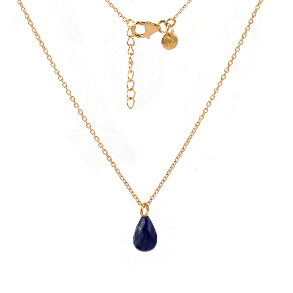 A delicate gold chain necklace featuring a small, teardrop-shaped dark blue gemstone pendant, displayed against a clean white background.