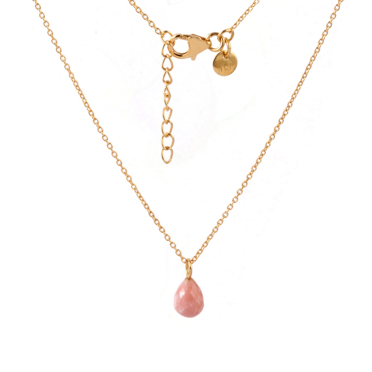 A delicate gold chain necklace featuring a small, teardrop-shaped light pink gemstone pendant, displayed against a clean white background.