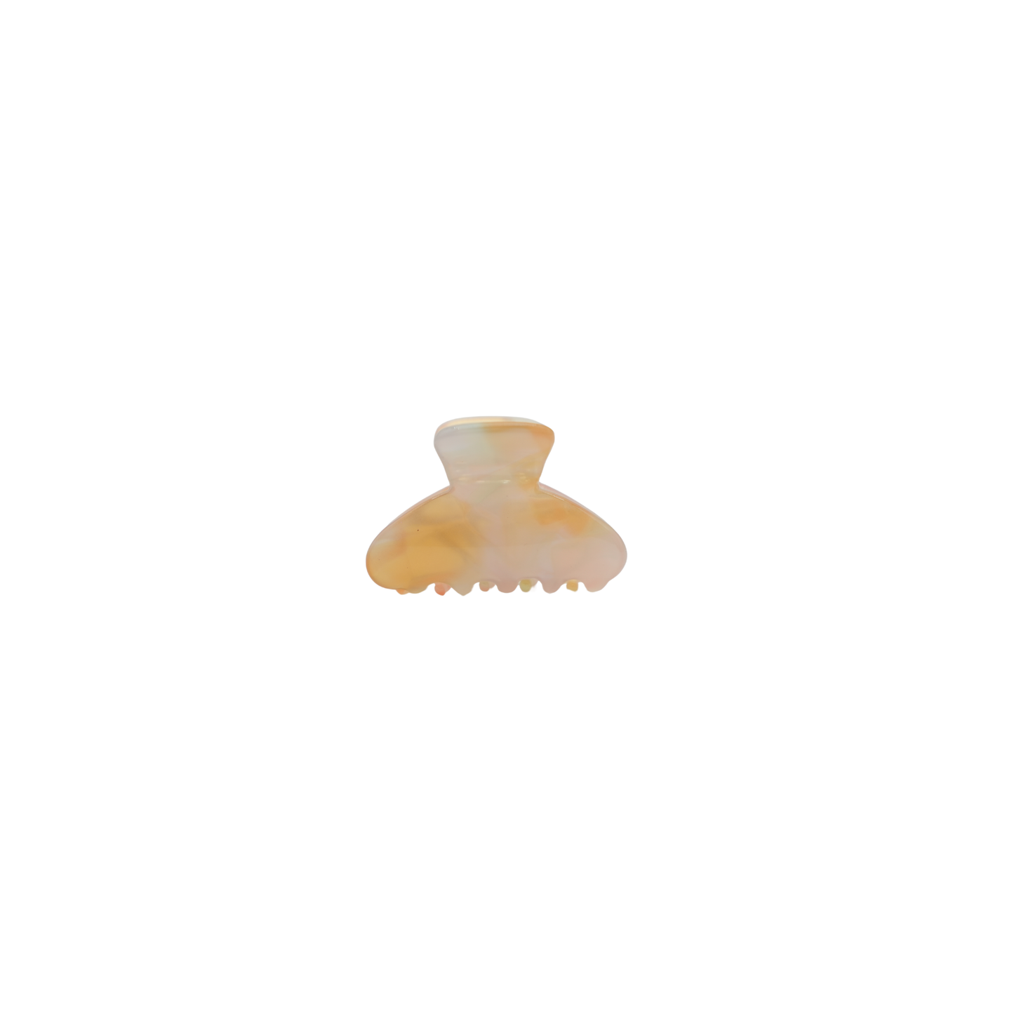 A small hair claw clip in a warm golden and pastel pink pattern made out of cellulose acetate, centered on a plain white background.