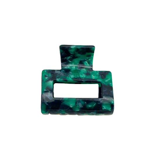 Small Emerald Grove hair claw clip in deep green and teal tones, made from cellulose acetate, front view on a white background.